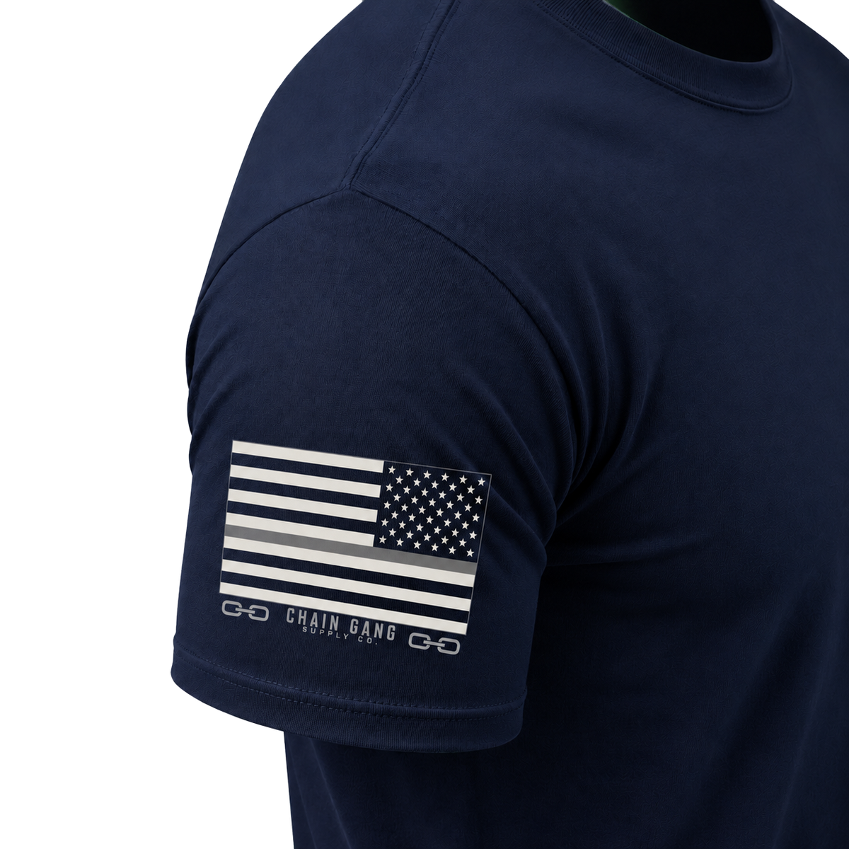Chain Gang Thin Gray Line Flag on the right sleeve of a navy shirt