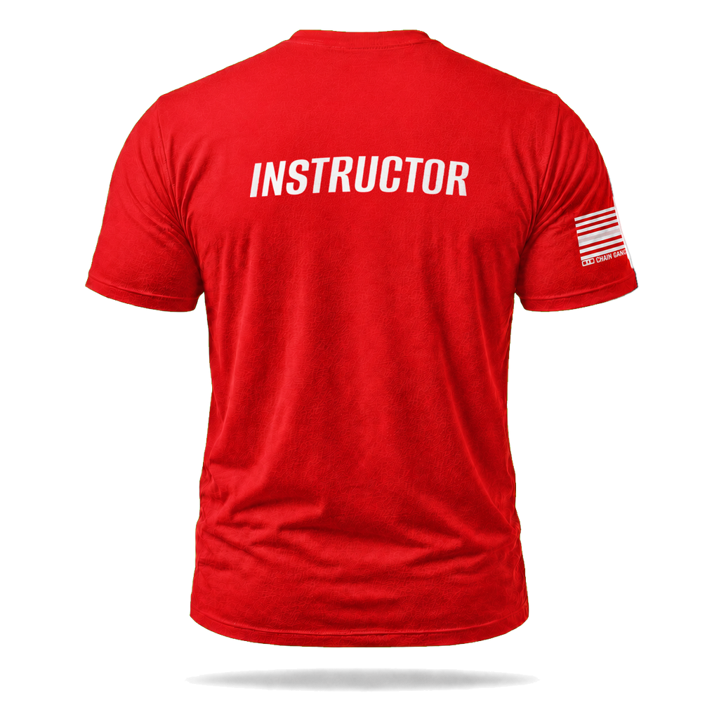Right-sleeve detail of red Corrections Instructor Performance Shirt – Red